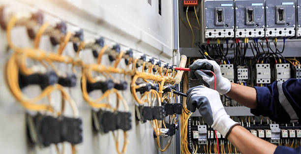 Professional Electrician technician working in Fall River, MA